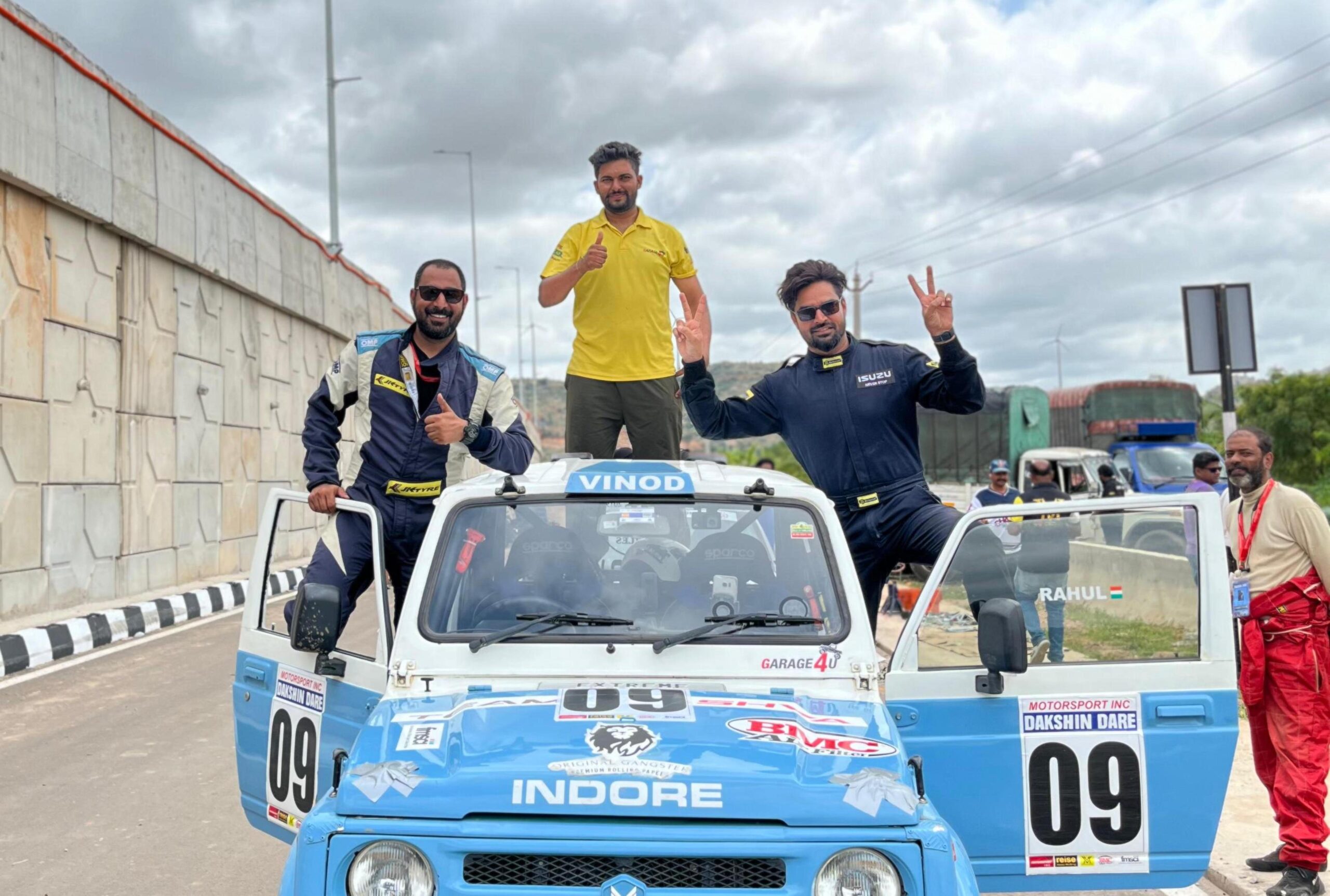 Dakshin Dare Overall winners cars. Vinodh Singh, left and Shailendra Singh. Yellow centre; Tuner Kapil Thakur at Anantapur stage finish on Sunday.