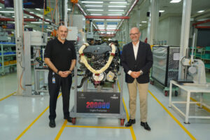 Mr. Prasan Firodia and Dr. Joerg Burzer with the 200000th Mercedes-Benz Engine Roll-out