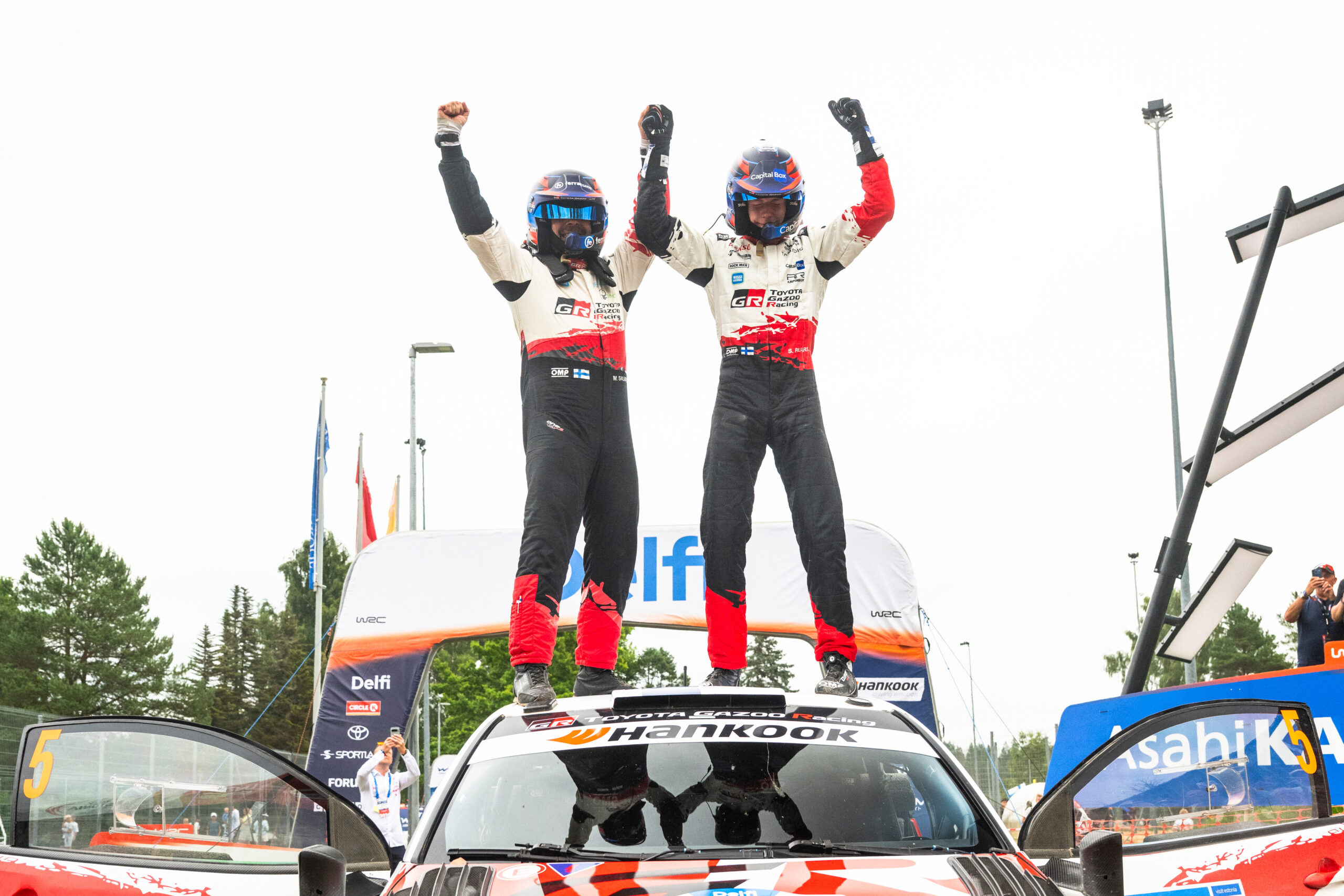 Sami Pajari (FIN), Marko Salminen (FIN) Of team TOYOTA GAZOO RACING WRT2 celebrate on the podium in first place after winning the WRC Rally1 category at WRC Delfi Rally Estonia in Tartu, Estonia on 19.07.2026 during the World Rally Championship Estonia in Tartu, Estonia on 19.07.2026 // Jaanus Ree / Red Bull Content Pool // SI202607190149 // Usage for editorial use only //