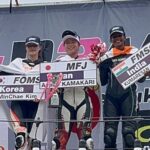 Jagathishree representing fmsci on the podium in Thailand