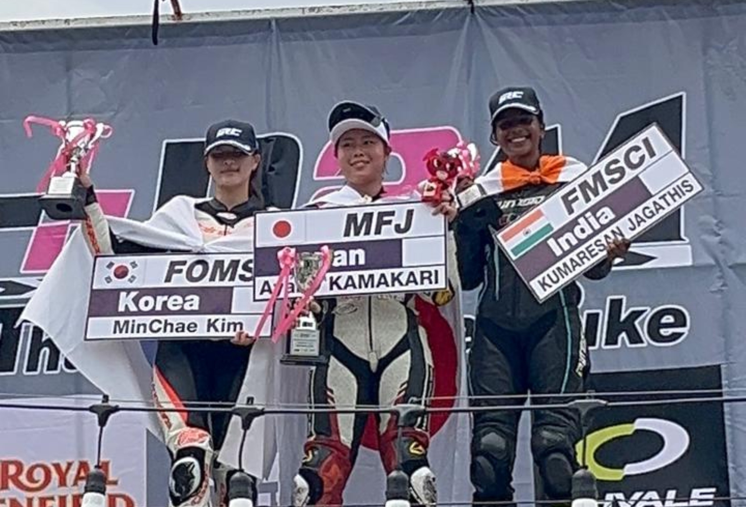 Jagathishree representing fmsci on the podium in Thailand